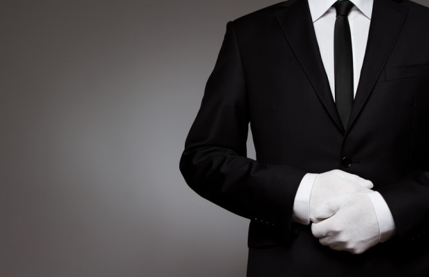 At Your service. Well dressed man waiting for orders with copy s