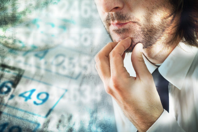 Businessman thinking about figures