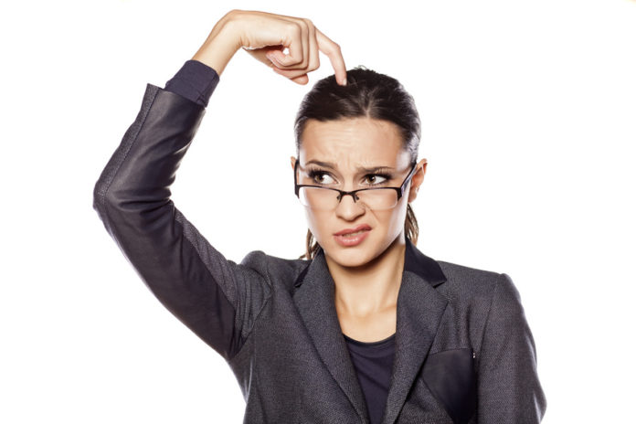 Lettre de motivation thoughtful beautiful business woman scratching her head Lettre de motivation