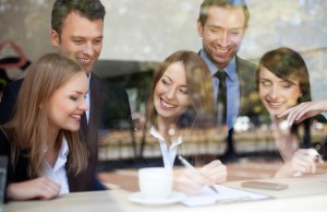 Group of business people in coffee shop