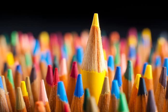Color pencils representing the concept of Standing out from the crowd